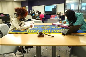 People working on banner 